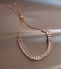 Elegant Rose Gold-Tone Slider Bracelet with Baguette-Cut Crystal Design
