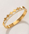 Elegant 18k Gold-Plated Bangle Bracelet with Four-Leaf Clover Motif and Sparkling Zirconia Detail