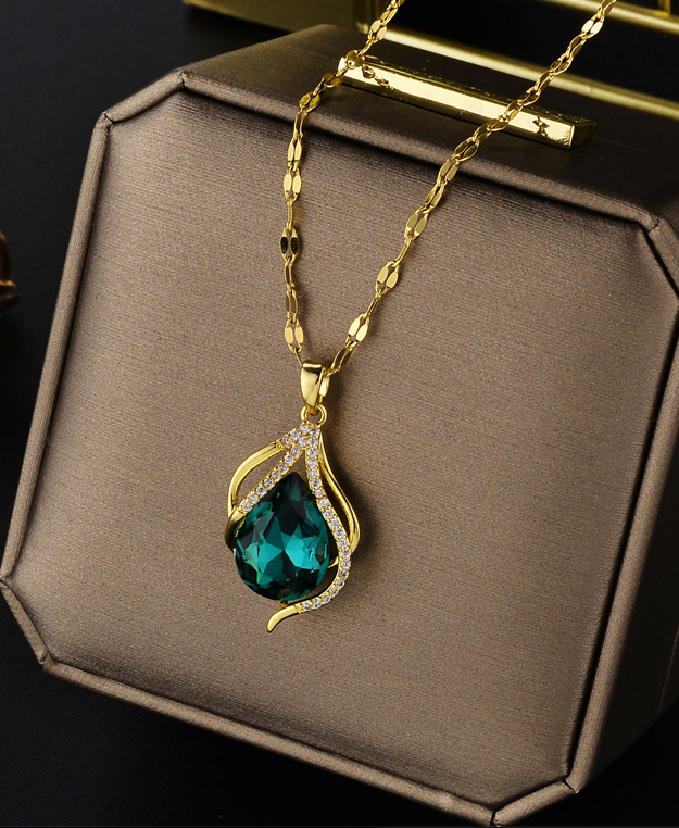18K gold-plated stainless steel necklace featuring a pear-cut green zirconia pendant in an elegant waterdrop design. A refined, minimalist piece for everyday wear or special occasions.