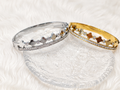 Elegant 18k Gold-Plated Bangle Bracelet with Four-Leaf Clover Motif and Sparkling Zirconia Detail